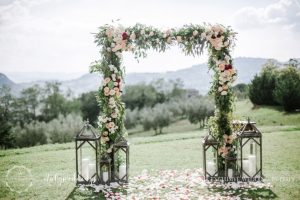 Wedding at Villa Ulignano floral arch