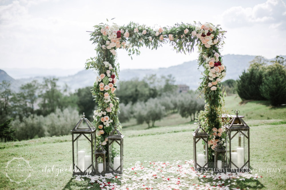 Wedding at Villa Ulignano floral arch
