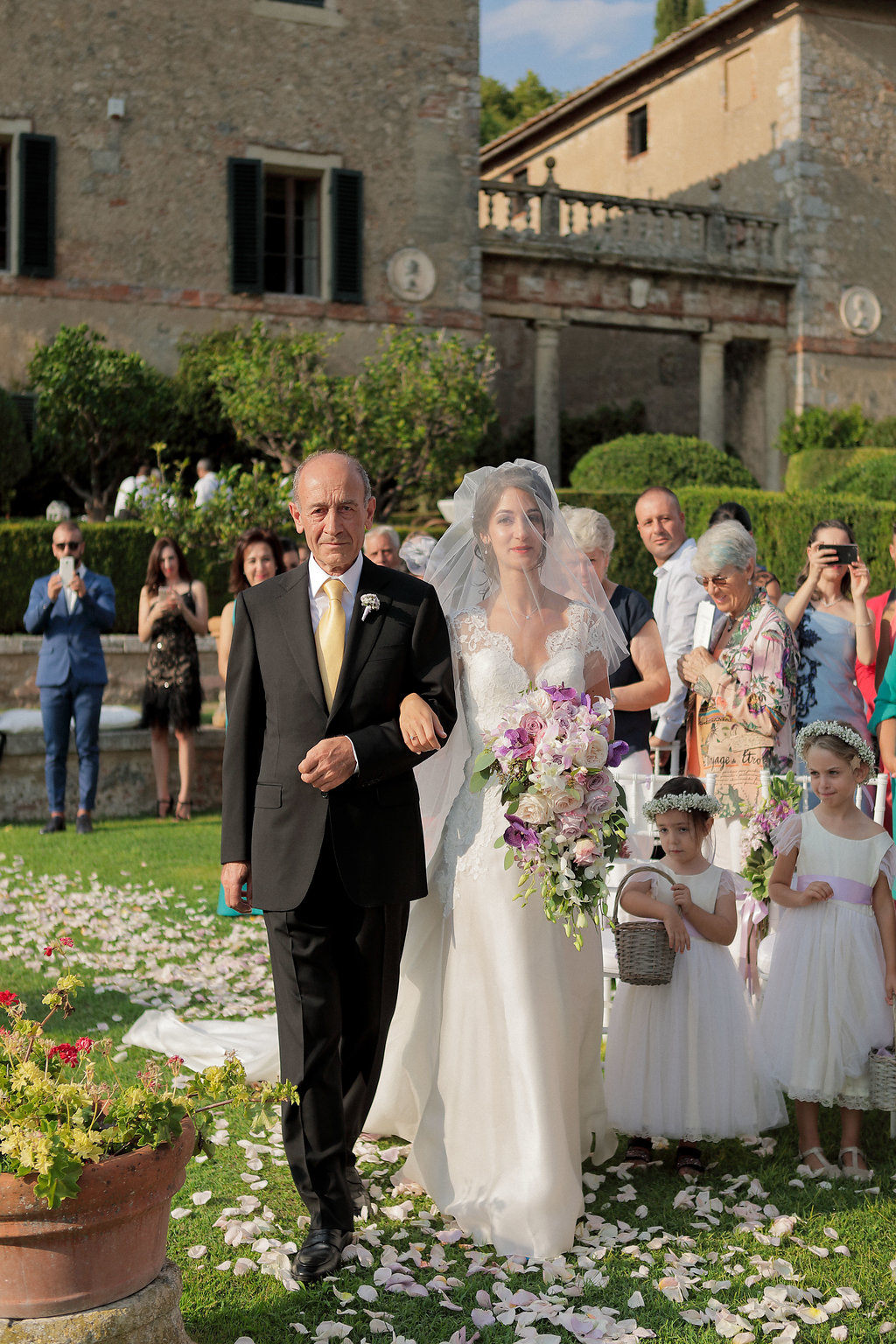 Luxury wedding blessing with secret garden lighting Tuscany