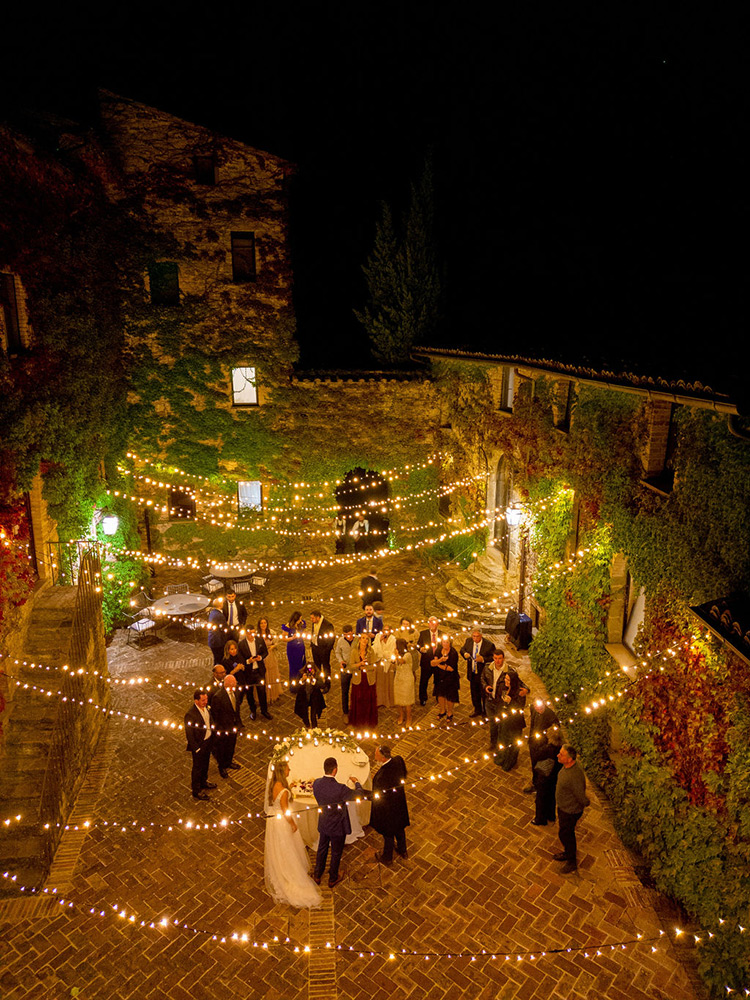 Autumn wedding blessing in converted hamlet, Umbria Italy